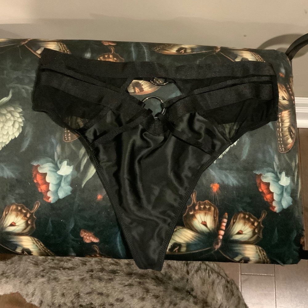 Black thong, unsure of brand